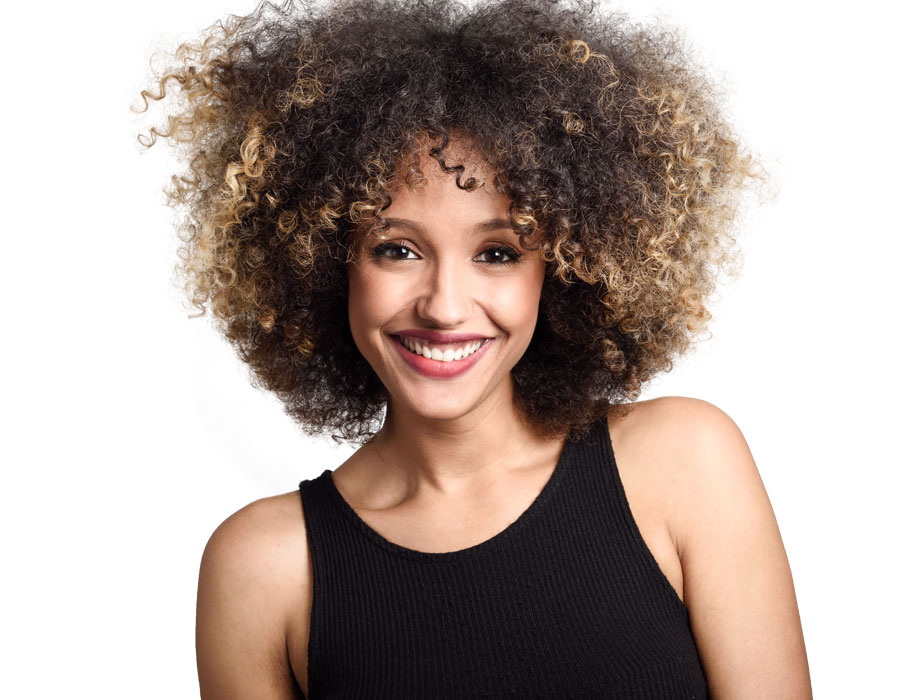 Young woman in black with curly hair